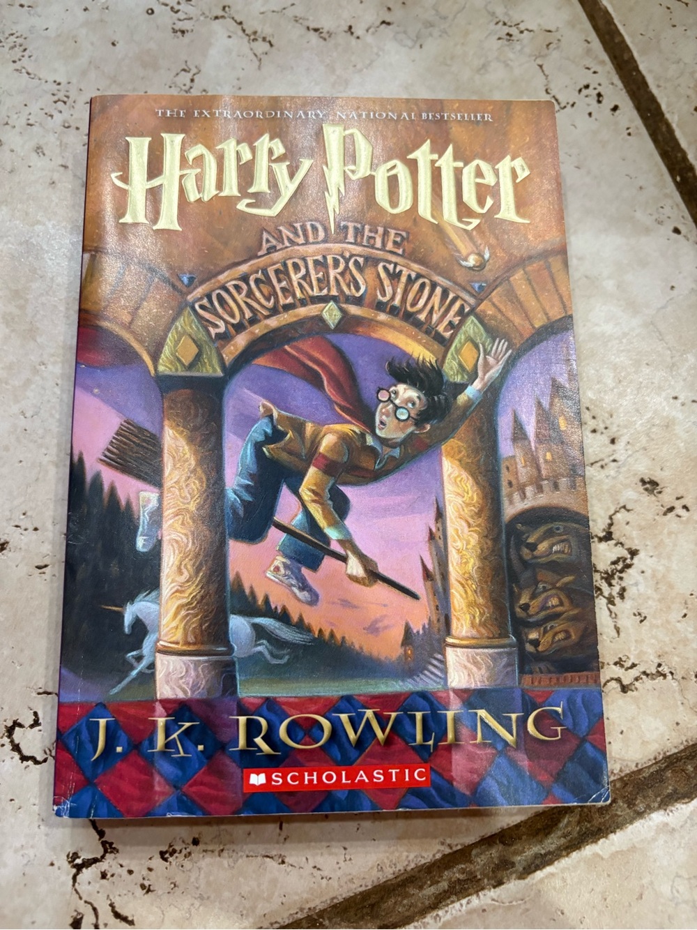 Scholastic Kids Fantasy Book Cover with Red, Blue, Gold and Purple Artwork
